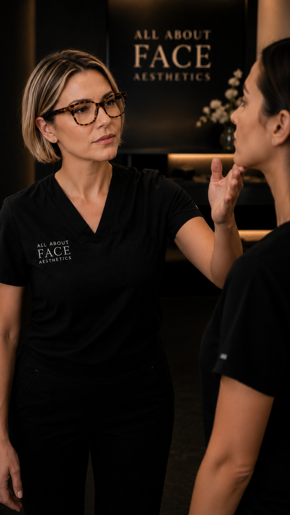 Registered health practitioner consulting with a patient at All About Face Aesthetics.